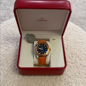 Omega Watch with Vibrant Orange Strap and Black Dial